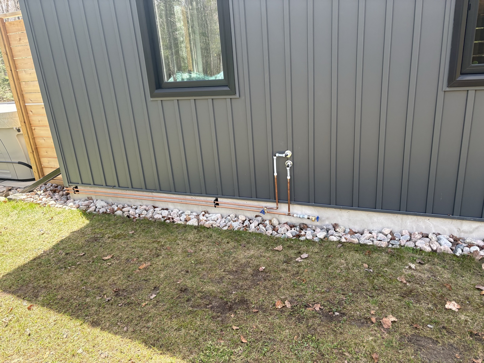 Real Thomas Plumbing job. Exterior water line and hose bib repair at the side of a North Bay home by Tyler Thomas.