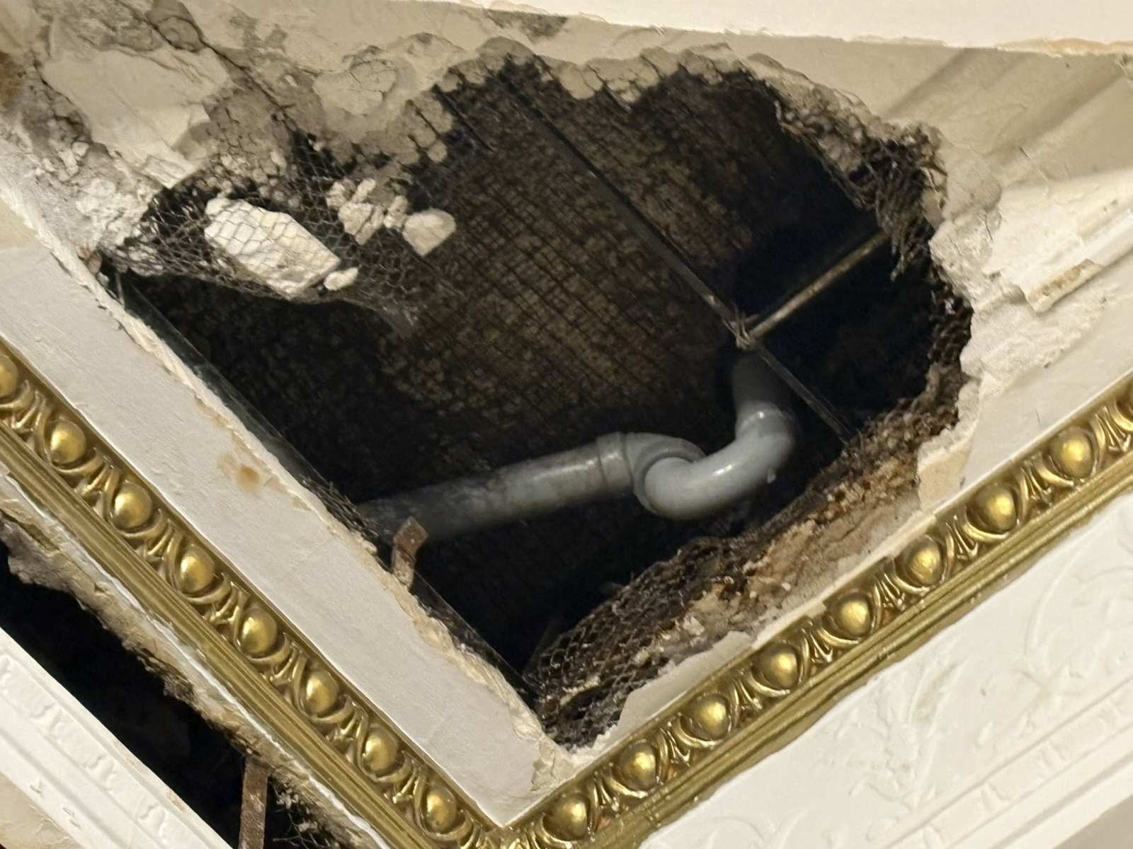 Real Thomas Plumbing job. Opened drywall ceiling revealing the source of a hidden in-wall leak that Tyler Thomas located and repaired on a North Bay emergency call.