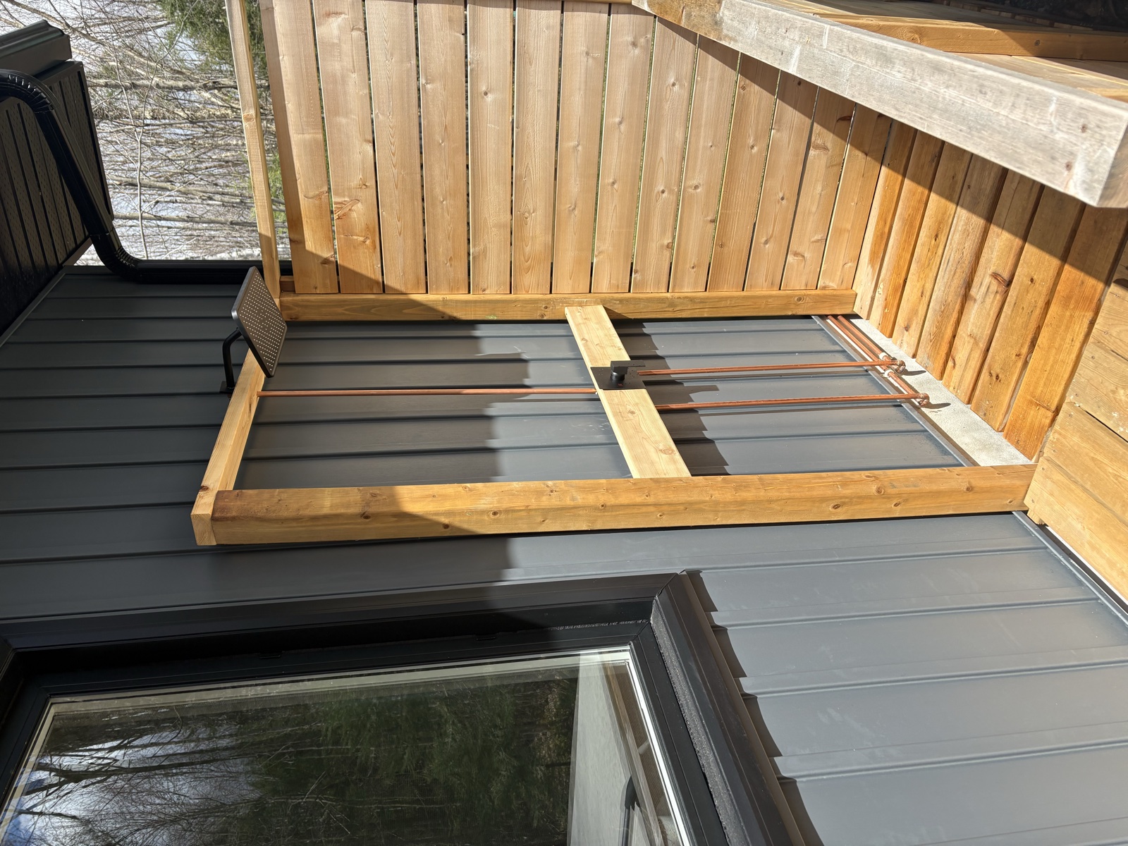 Real Thomas Plumbing job. Outdoor deck plumbing rough-in with copper supply lines installed on a North Bay residential property by Tyler Thomas.